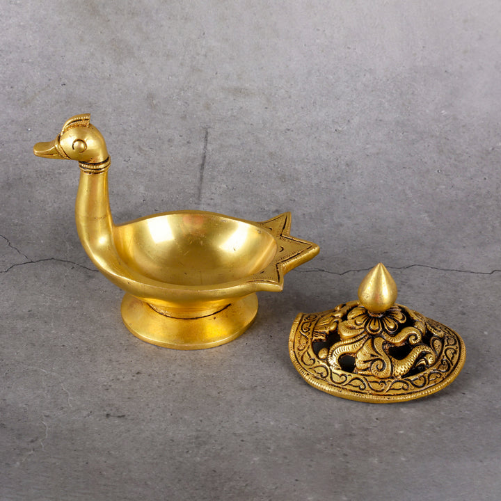 Brass dhoop deep duck shape aroma lamp — close-up material