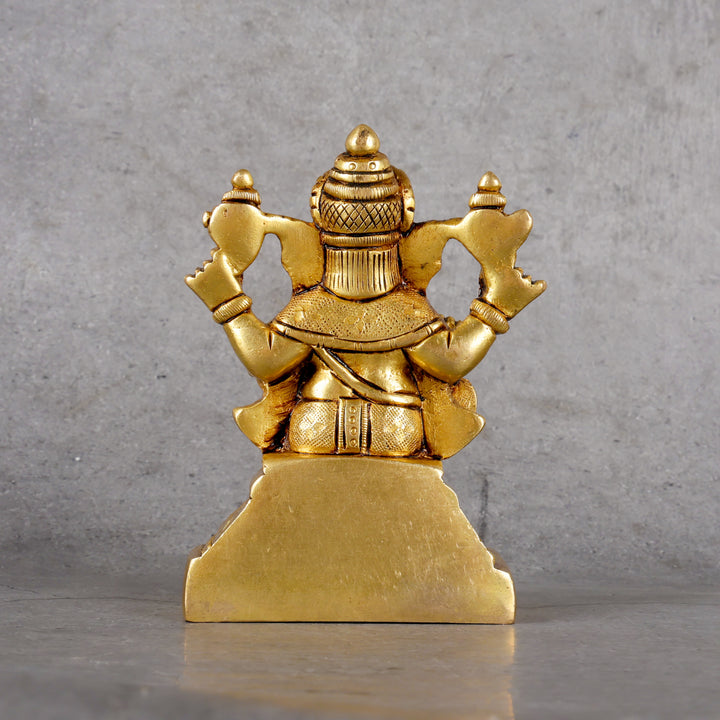 Brass Ganesha statue pital Ganesh murti — lifestyle in-use shot
