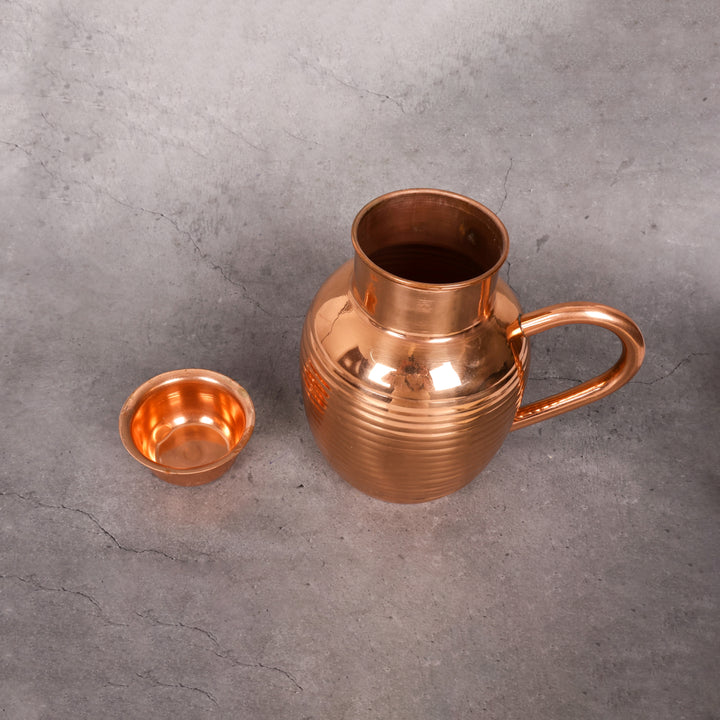 Copper jug with lid tamba water pitcher — close-up material