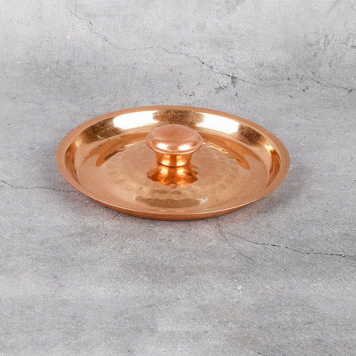 Copper matka with lid hammered tamba storage — close-up material