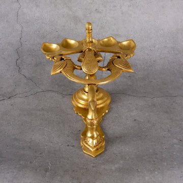 Brass Panch Mukhi Diya - Traditional Ceremonial Lamp - Lifestyle or in-use shot showing context and product scale.