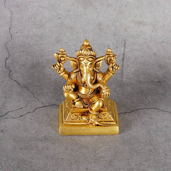 Brass Ganesha Statue - Traditional Elephant Deity - Detailed side angle view showing key features and dimensions.