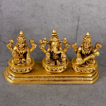 Brass Ganesha Laxmi Saraswati - Trinity Deities Set - Detailed side angle view showing key features and dimensions.