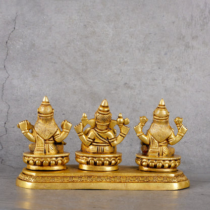Brass Ganesha Laxmi Saraswati - Trinity Deities Set - Close-up shot highlighting material