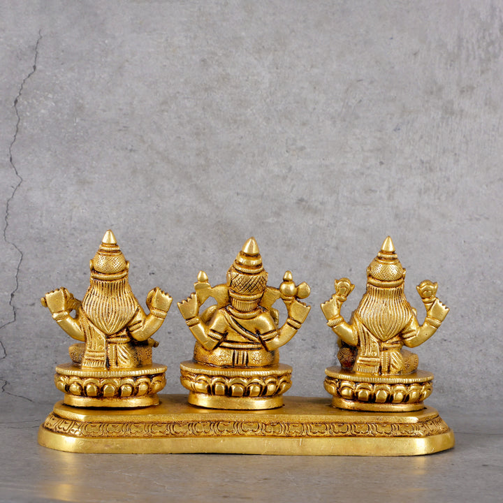 Brass Ganesha Laxmi Saraswati - Trinity Deities Set - Close-up shot highlighting material