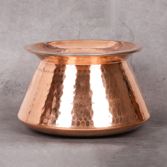 A jointless biryandi handi copper degh, used for cooking.