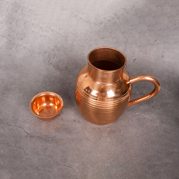 Copper Water Jug with lid- Traditional Serving Pitcher | Elegant design - Close-up shot highlighting material